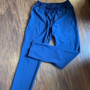 Navy. Size small scrub star pants. EEEUC, hung to dry.
